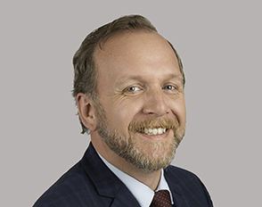 Elisher J. Williams headshot.